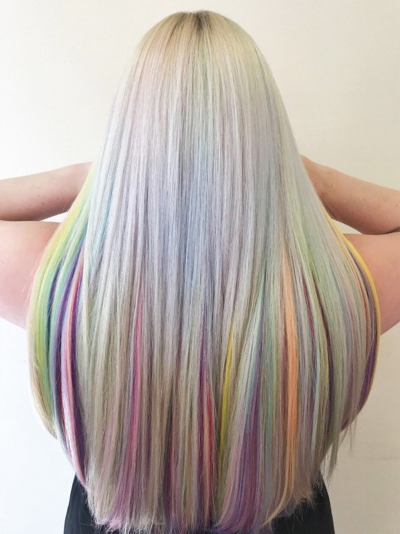Model showing beautiful unicorn clip-in hair extensions